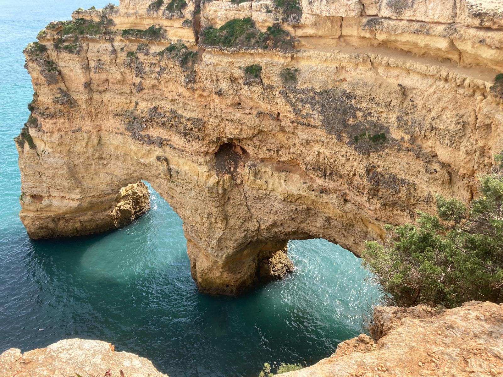 Rock arches and sea at Praia da Marinha in the Algarve